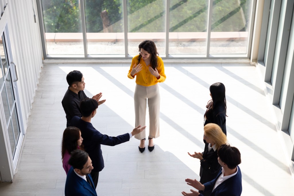 business people sharing one lesson learnt as a part of networking icebreaker