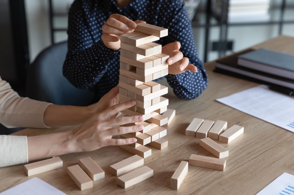 corporate event attendees playing networking jenga