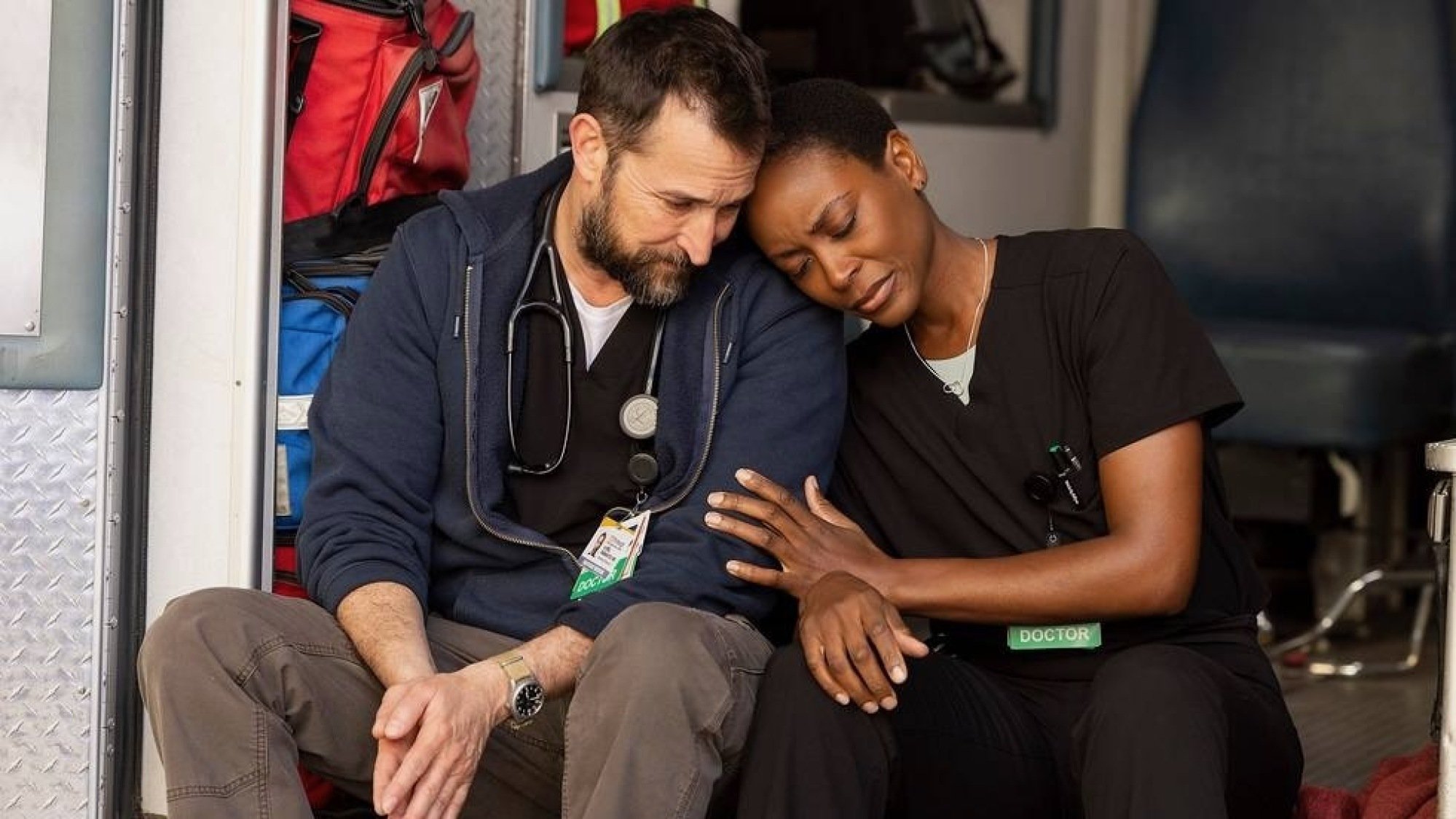 Noah Wyle and Tracy Ifeachor lean on each other in 